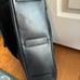 Tumi — black leather briefcase/shoulder bag — fits 15” laptop
