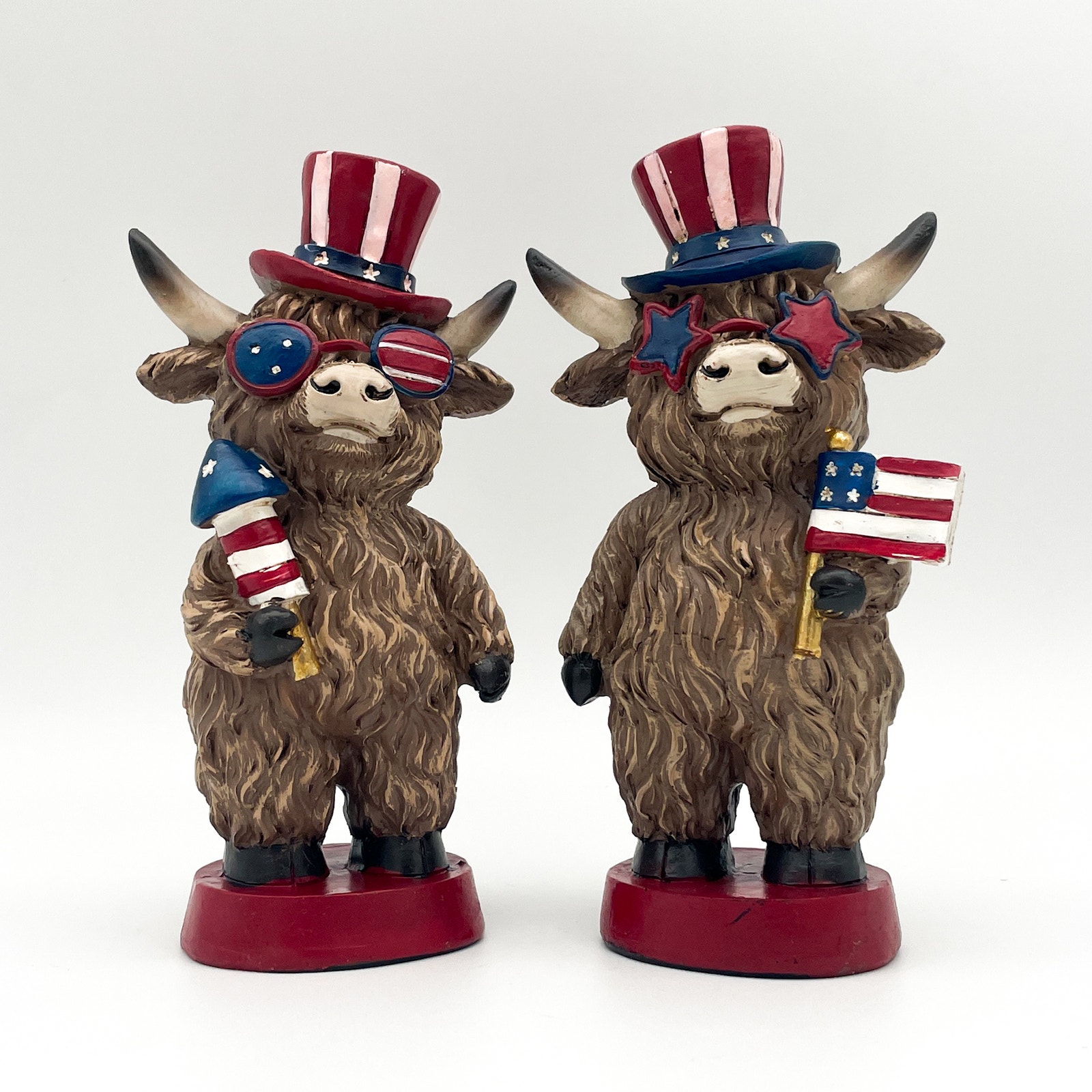 Set of 2 Fourth of July Highland Cow Resin Figurines - American Flag & Firework
