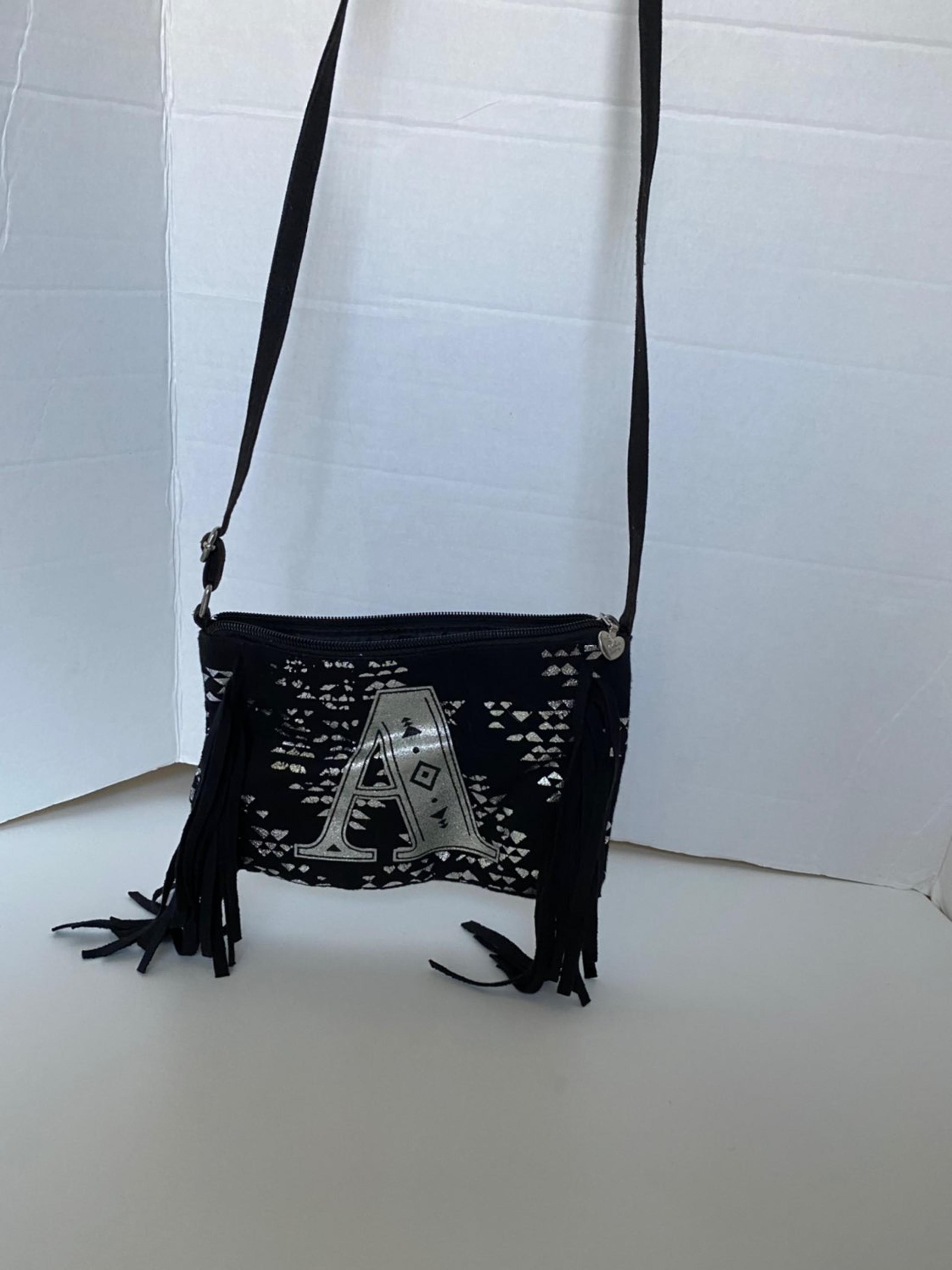 Justice crossbody purse
