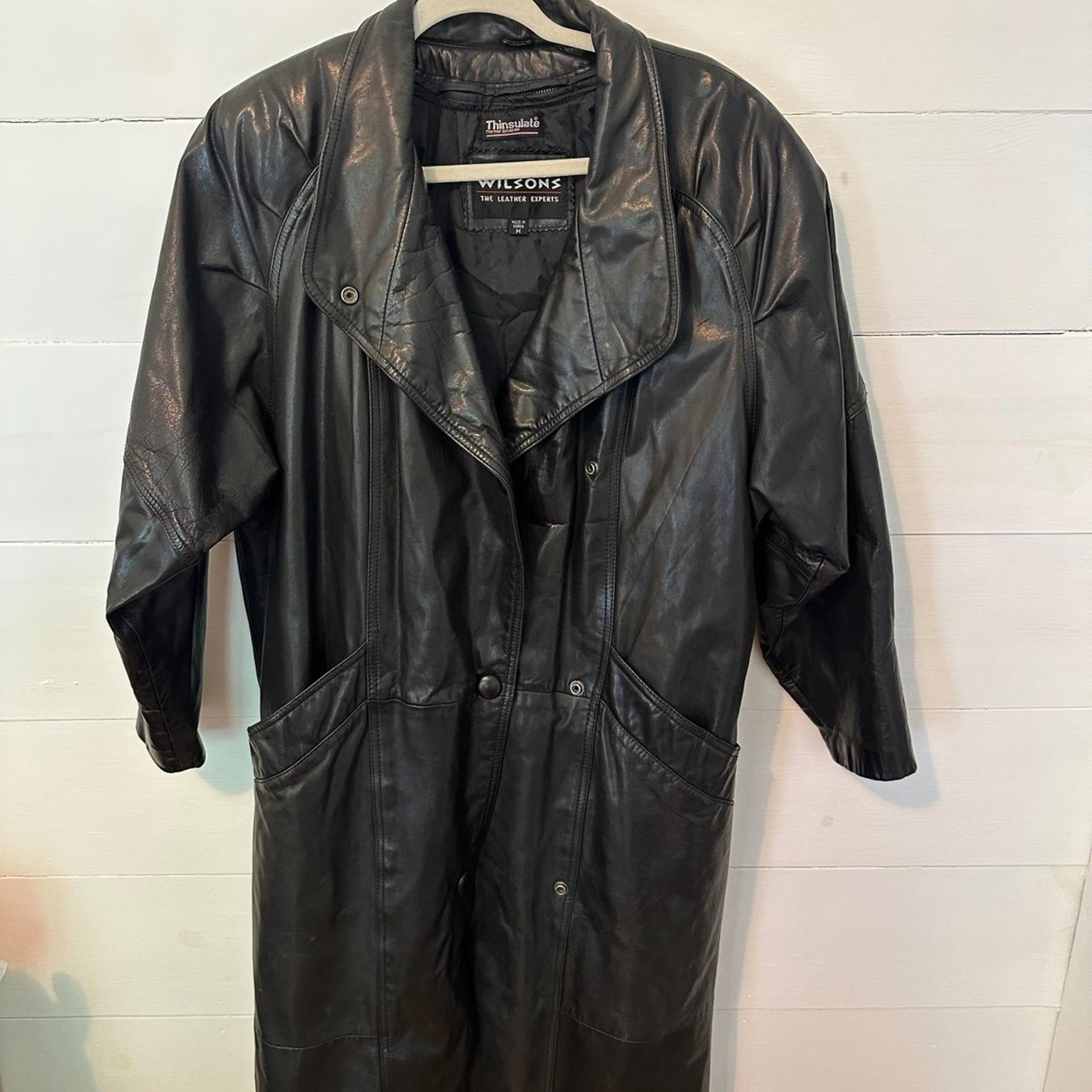Wilson’s long leather coat