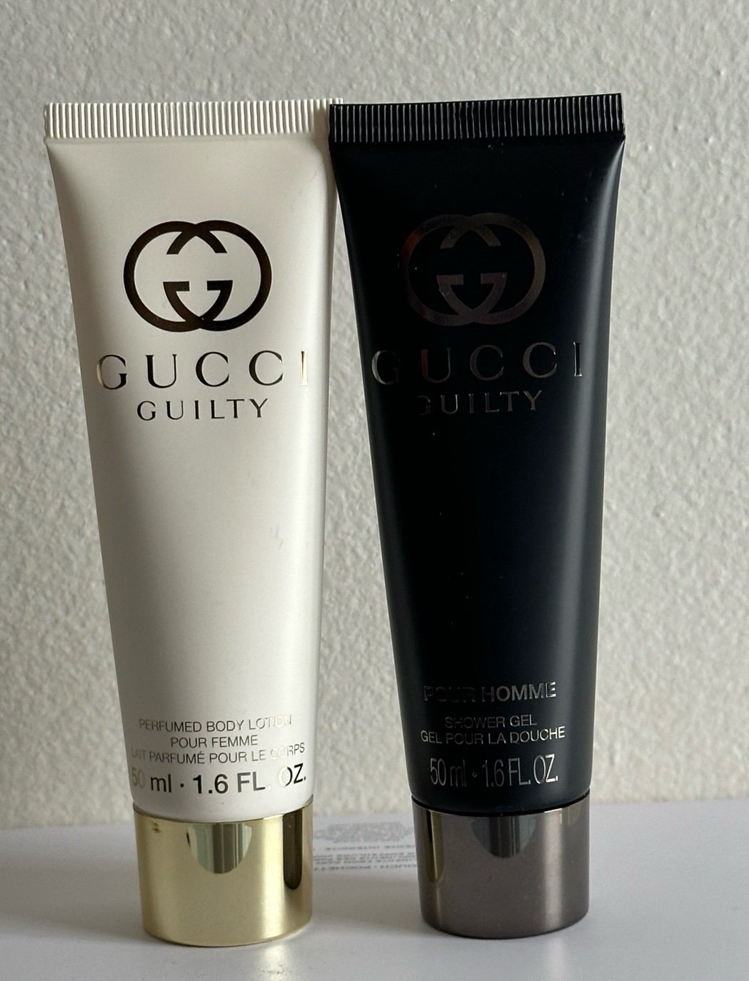 Gucci guilty homme and femme body lotion set