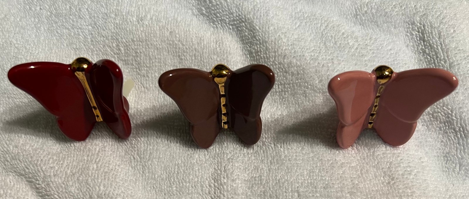 Nora Fleming “new” dusty rose butterfly (selling only one butterfly)