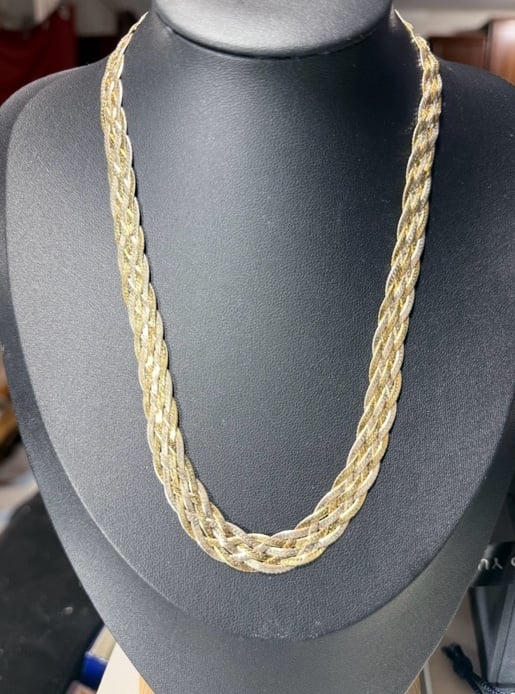 Sterling silver and 14 kt gold necklace braided 24 inches