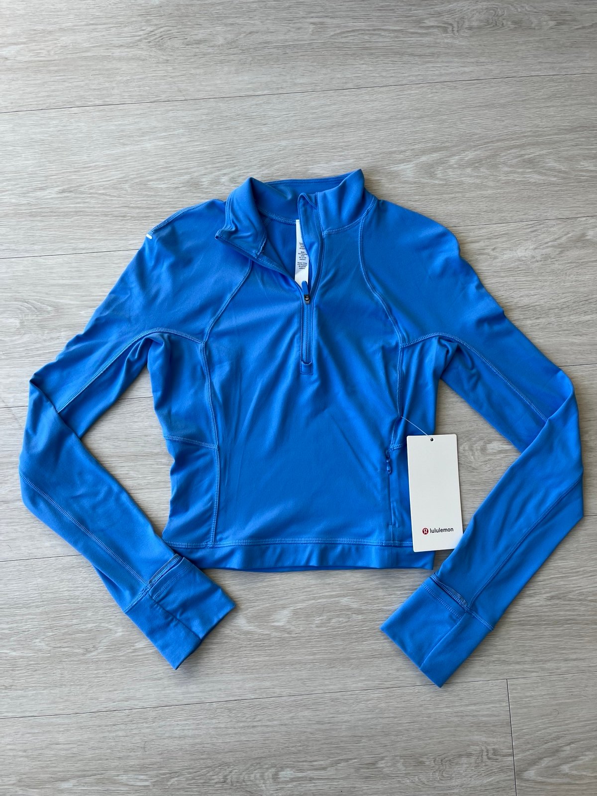 NWT Lululemon its run rulu cropped 1/2 zip jacket - blue Nile color - size 2