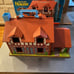 Fisher Price Vintage Play Family House in VGUC but damaged box