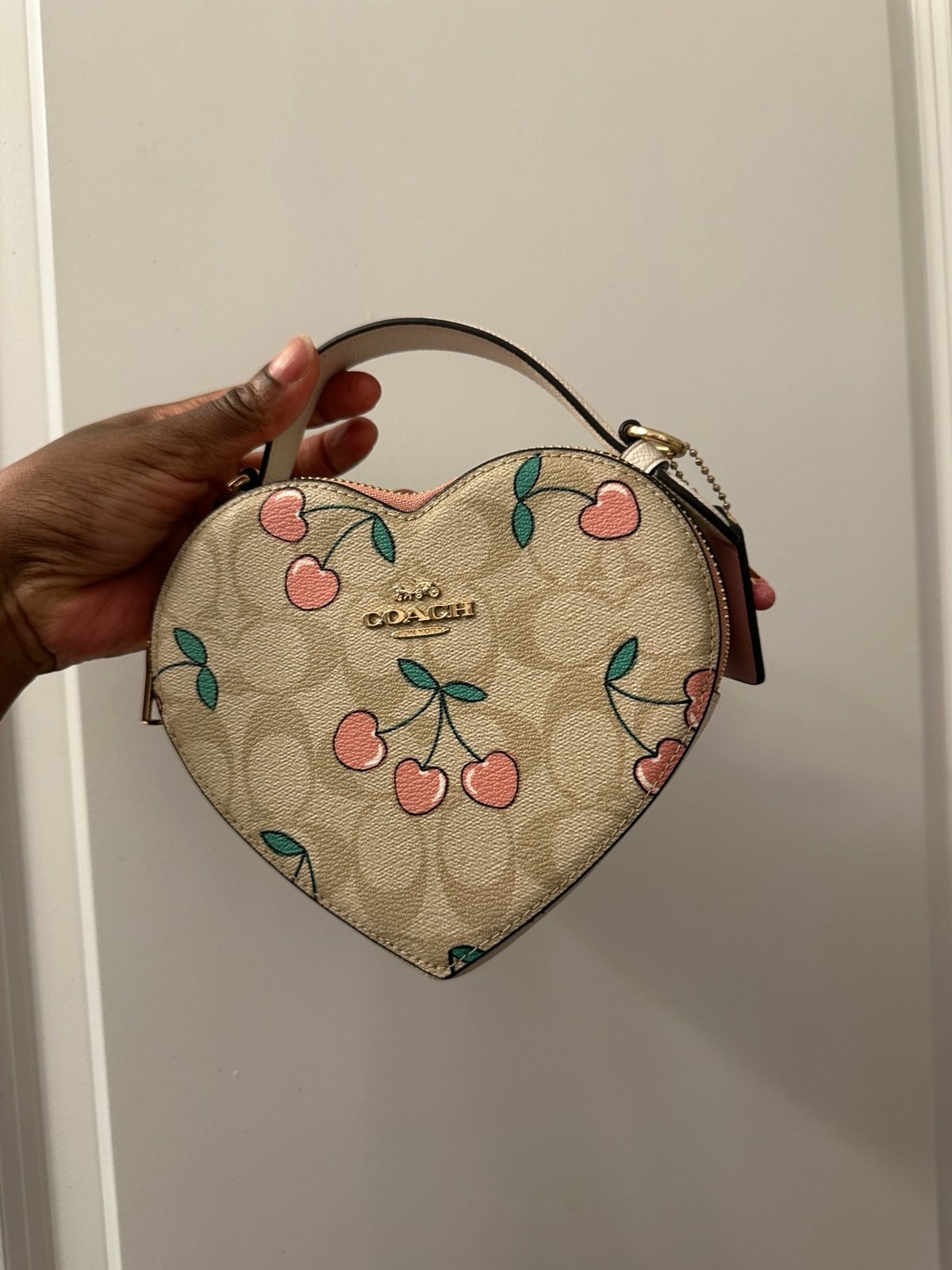 Coach Heart shaped purse with pink cherry
