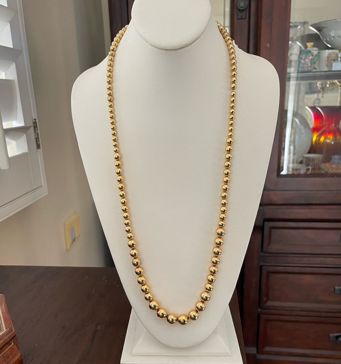 Lauren Ralph Lauren stamped LRL graduated gold bead 30 inch long necklace