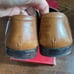 Salvatore Ferragamo Paese” maple calf slip on loafers with gold detailing