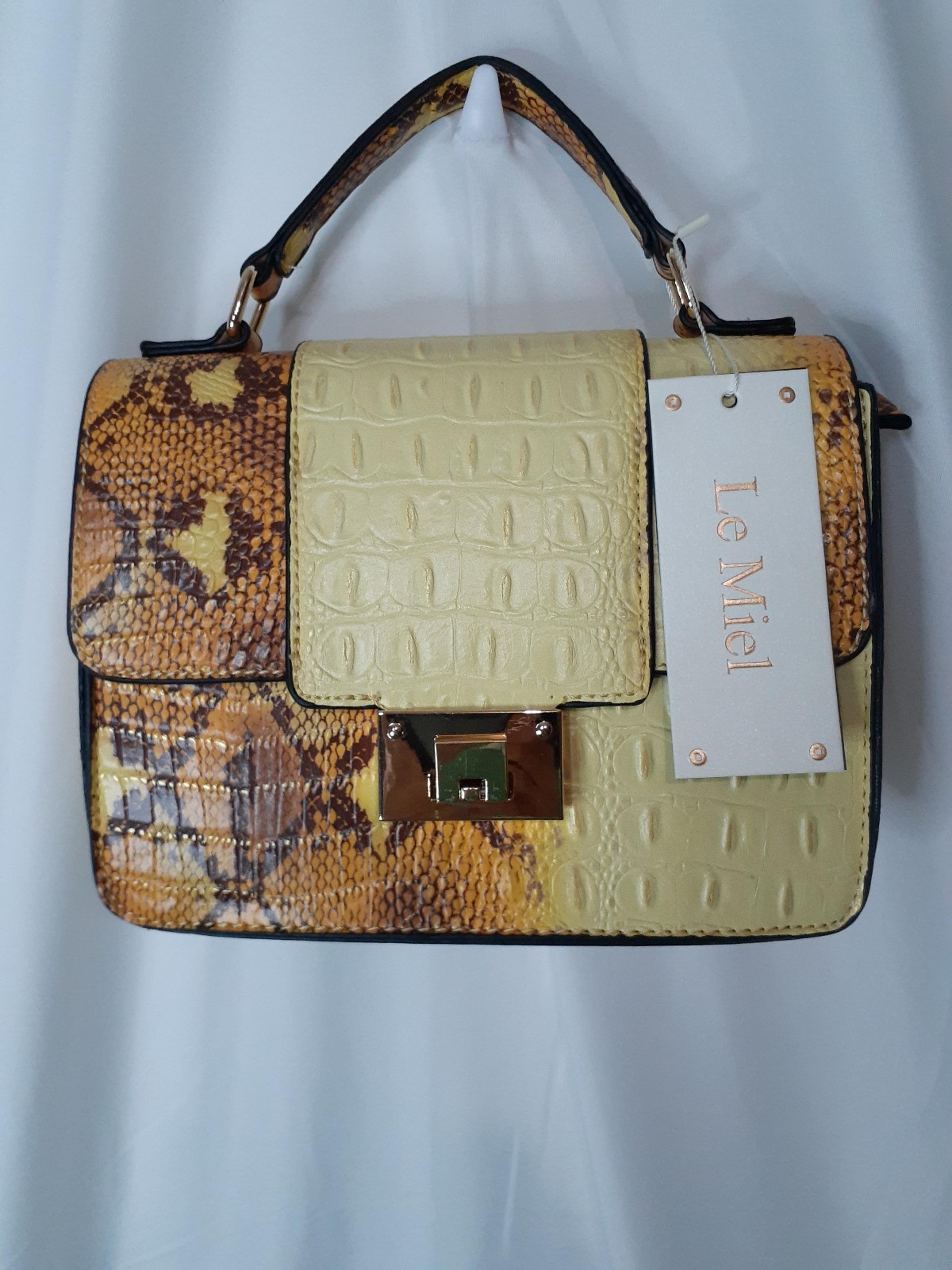 Le Meil snake skin clutch