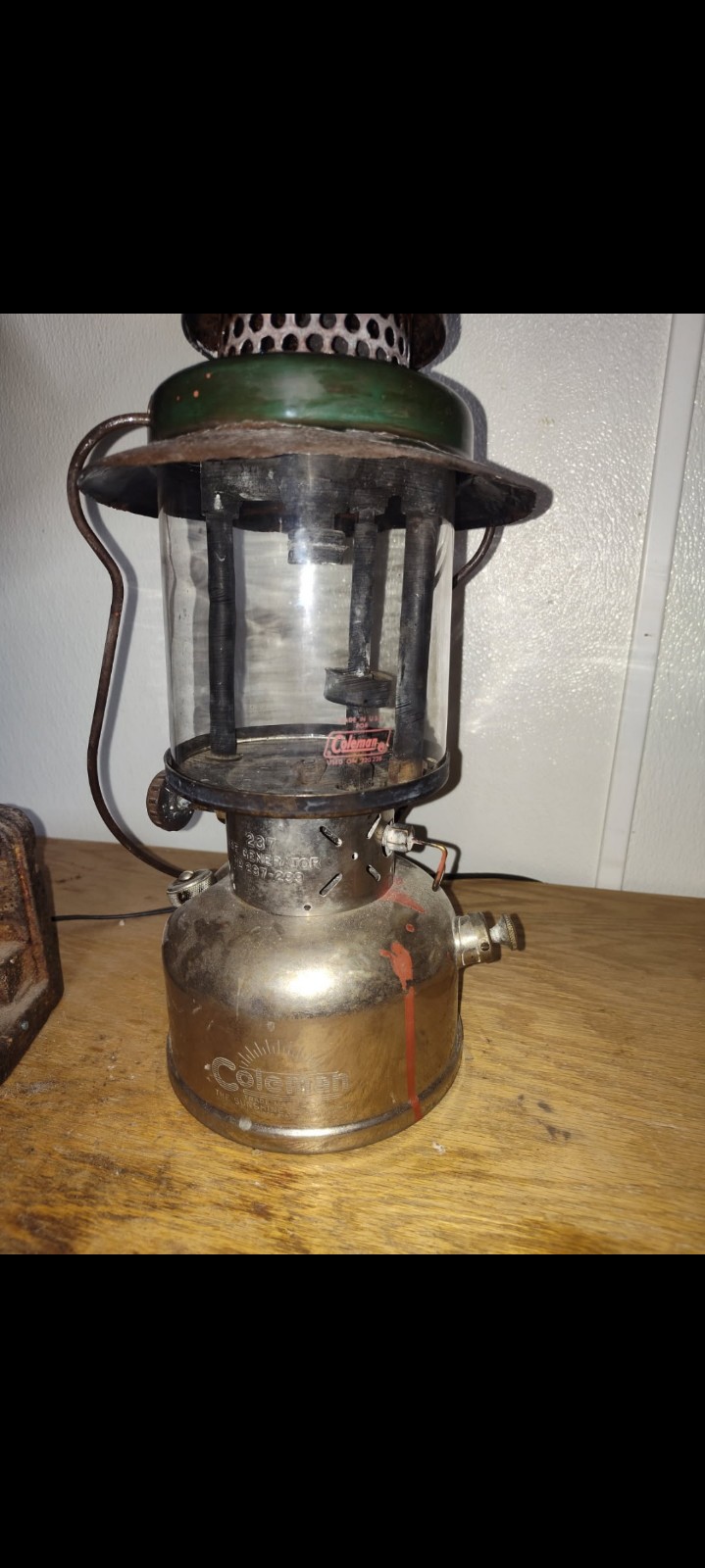Vintage Coleman lantern with vintage Coleman funnel