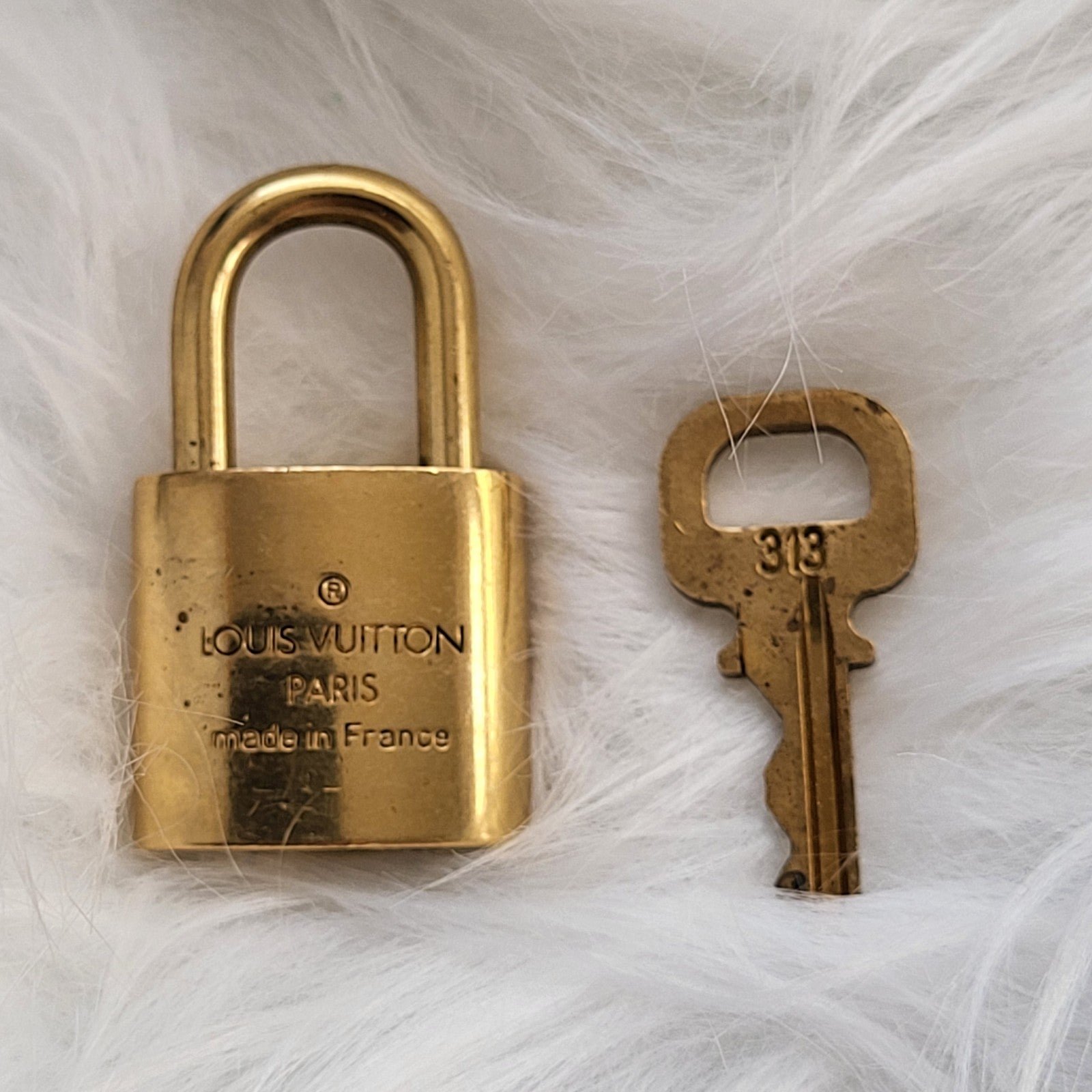 Authentic Louis Vuitton lock and key set #313