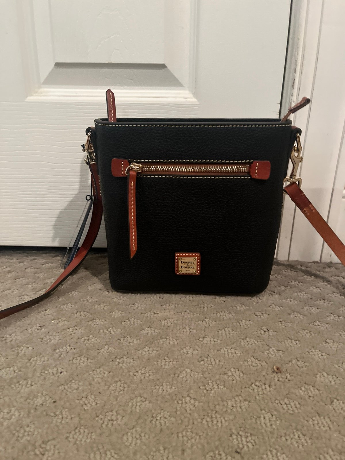 Dooney and Bourke black pebble leather Crossbody purse