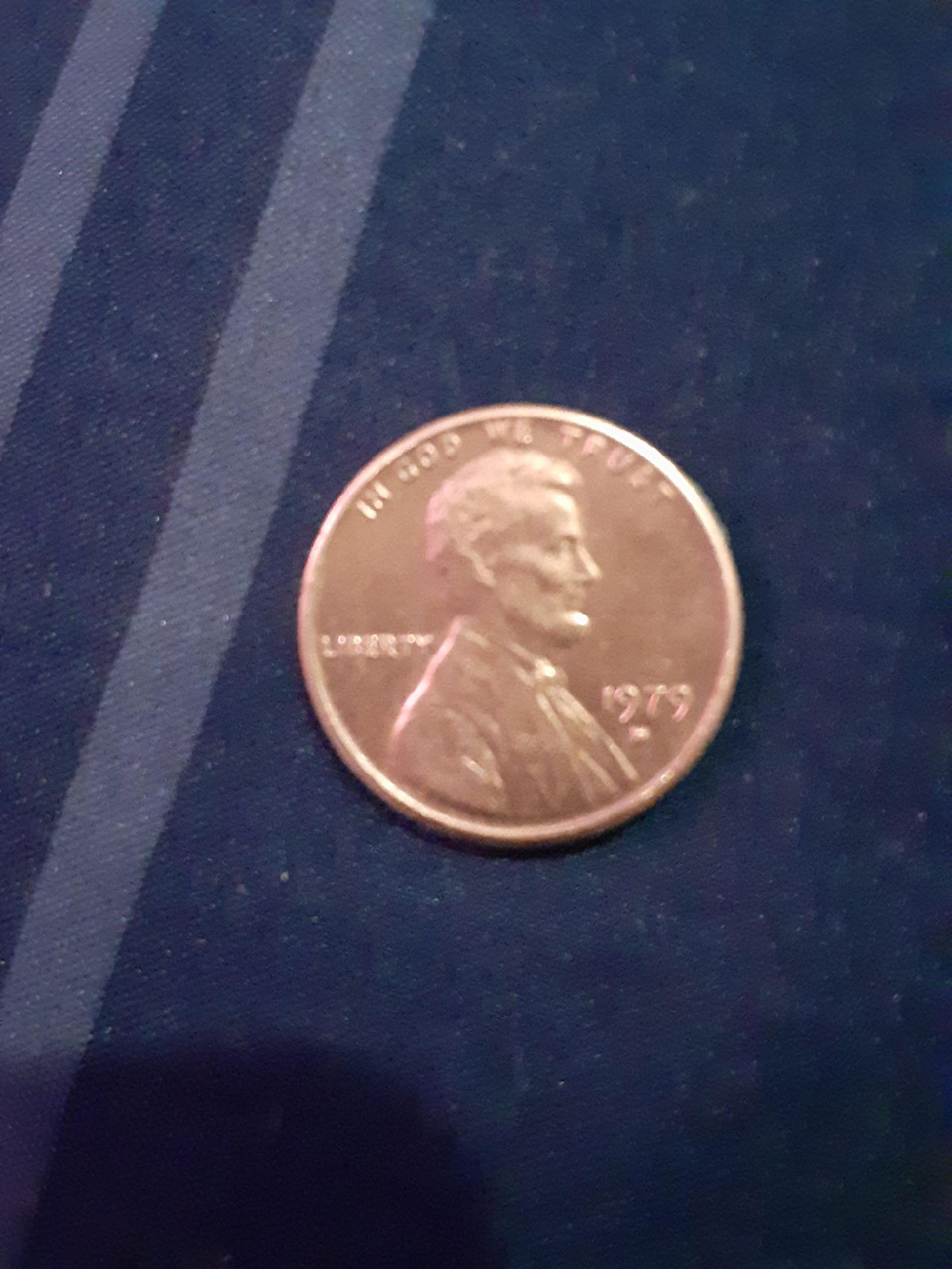 1979 D penny error on Rim strike