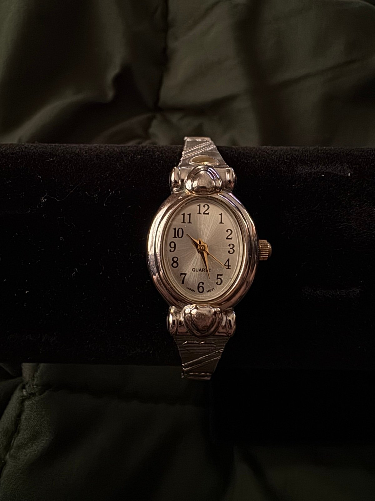 Silver heart watch with a touch of gold