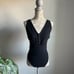 Free People Larissa Snap Button Tank Bodysuit in Black