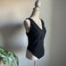 Free People Larissa Snap Button Tank Bodysuit in Black