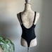 Free People Larissa Snap Button Tank Bodysuit in Black