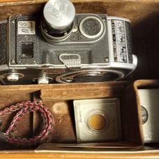 Vintage Bolex-Paillard B8 8mm movie camera with accessories