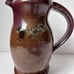 Signed Studio Stoneware Pottery Pitcher Multi Colored Iorn Red Glaze