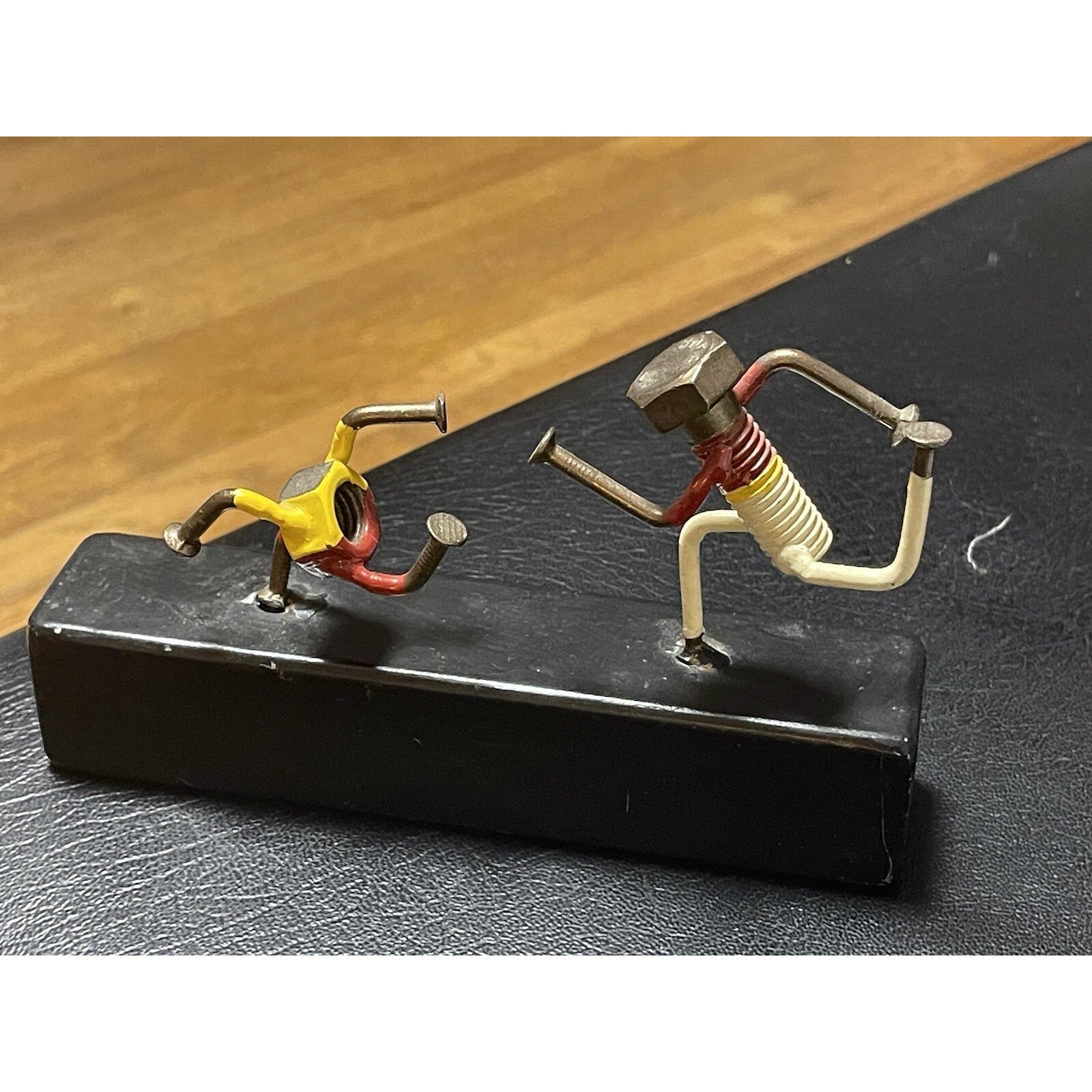 Scrap Metal Bolt Chasing Nut Figurine