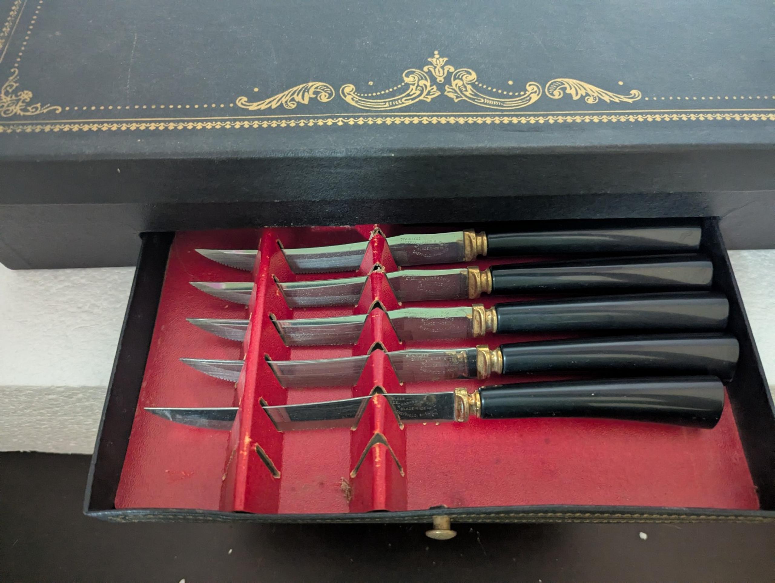 Sheffield stainless steel knife set. Missing one steak knife/sharpener