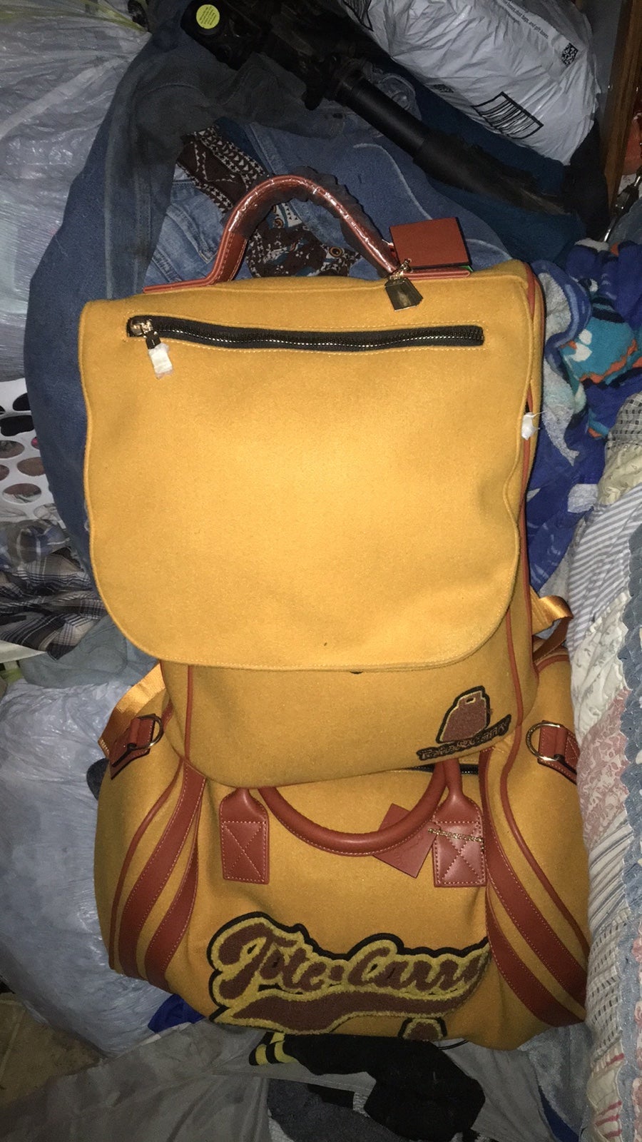 Tote & carry varsity backpack