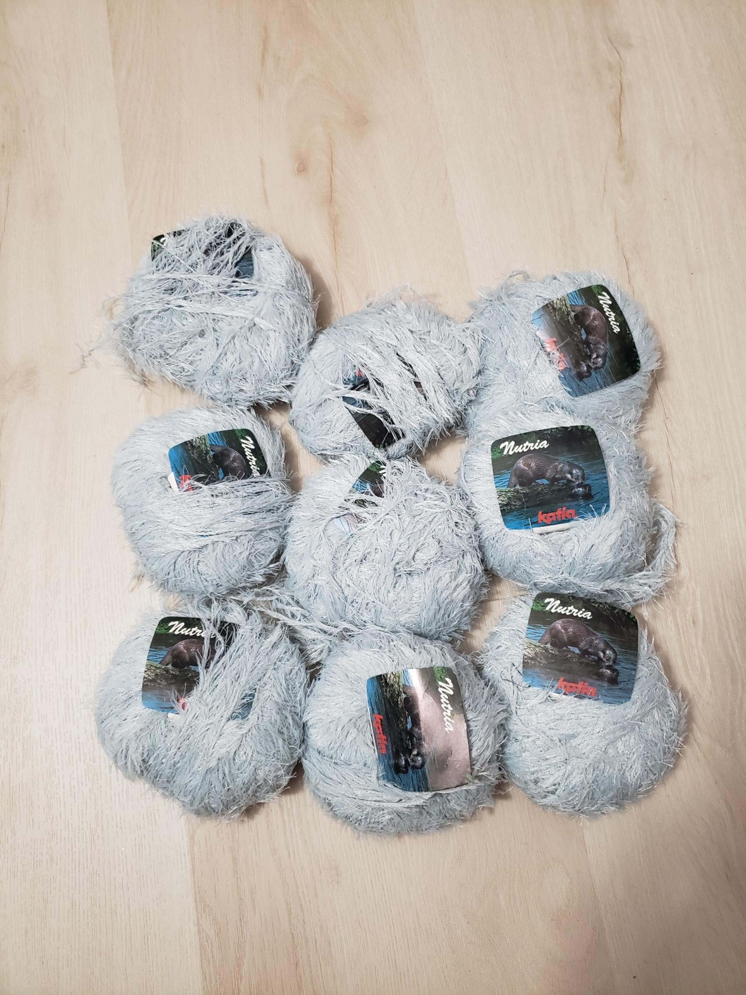 9 Balls of Katia Nutria Eyelash Yarn in Light Gray