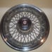 One Oldsmibile Delta 88 Custom Cruiser wire hubcap 1980s