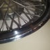 One Oldsmibile Delta 88 Custom Cruiser wire hubcap 1980s