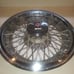 One Oldsmibile Delta 88 Custom Cruiser wire hubcap 1980s