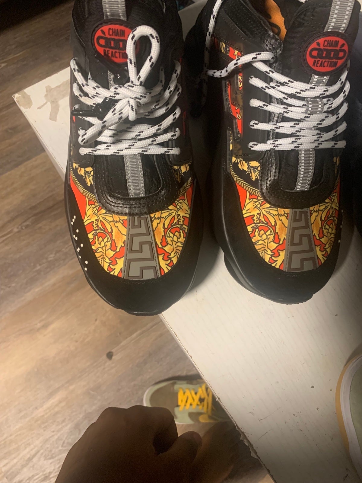 Versace chain reaction