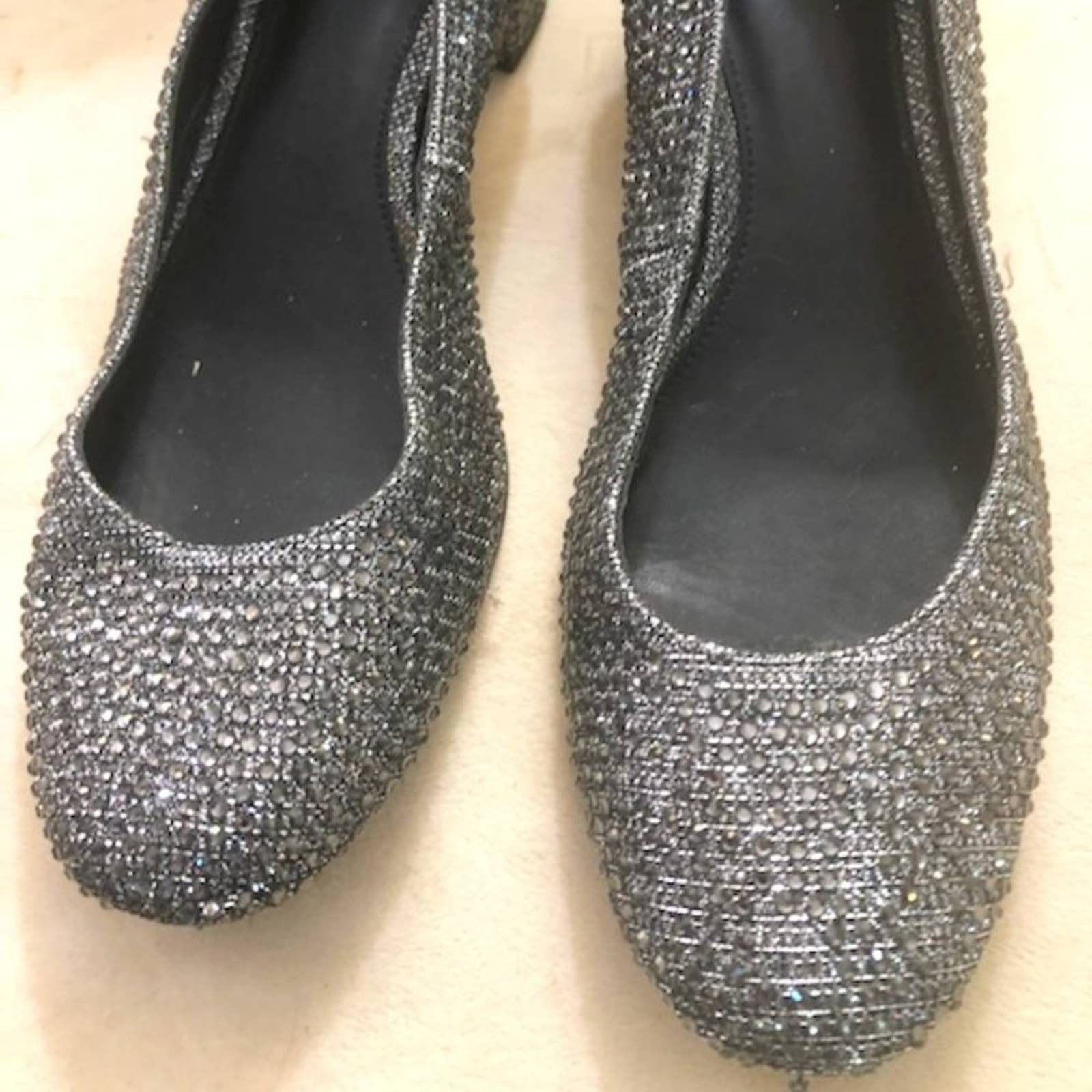 Michael Kors size 9 silver shoes with small chunky heel , worn twice