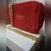 CHANEL COSMETIC BAG RED/GOLD GLITTER WIITH ORIGINAL BOX, CHAIN AND BAG TASSLE