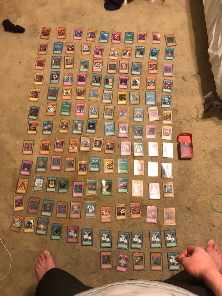 Vintage lamenated Yu Gi Oh card deck. In