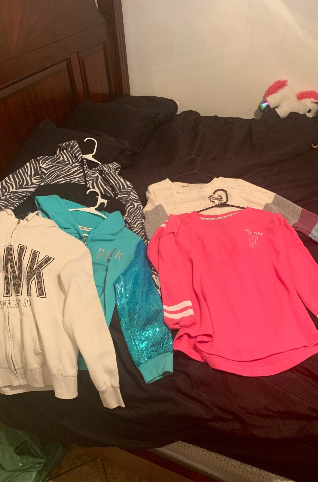Pink sweaters and hoodies