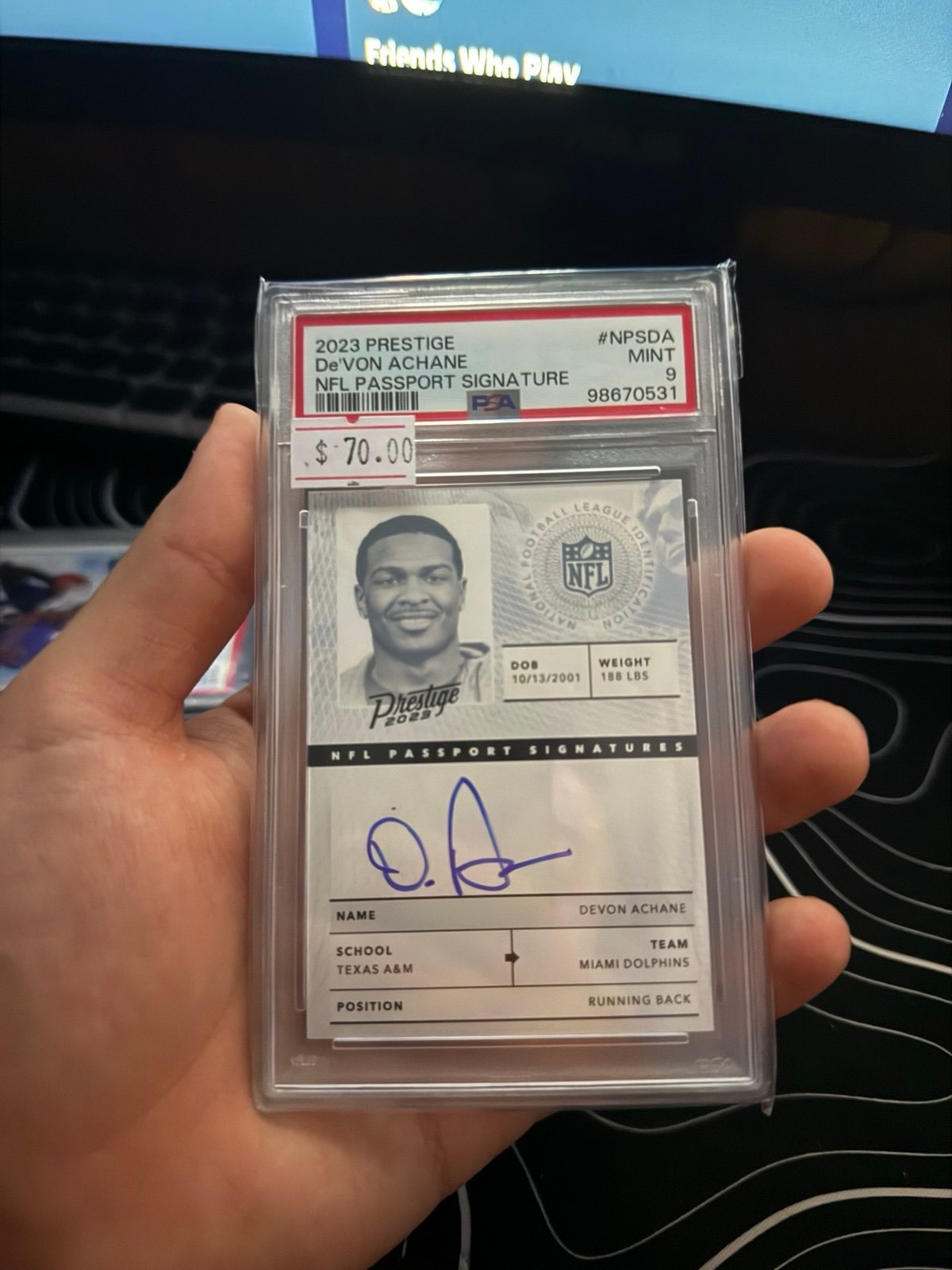PSA 9 NFL Passport Auto Devon Achane