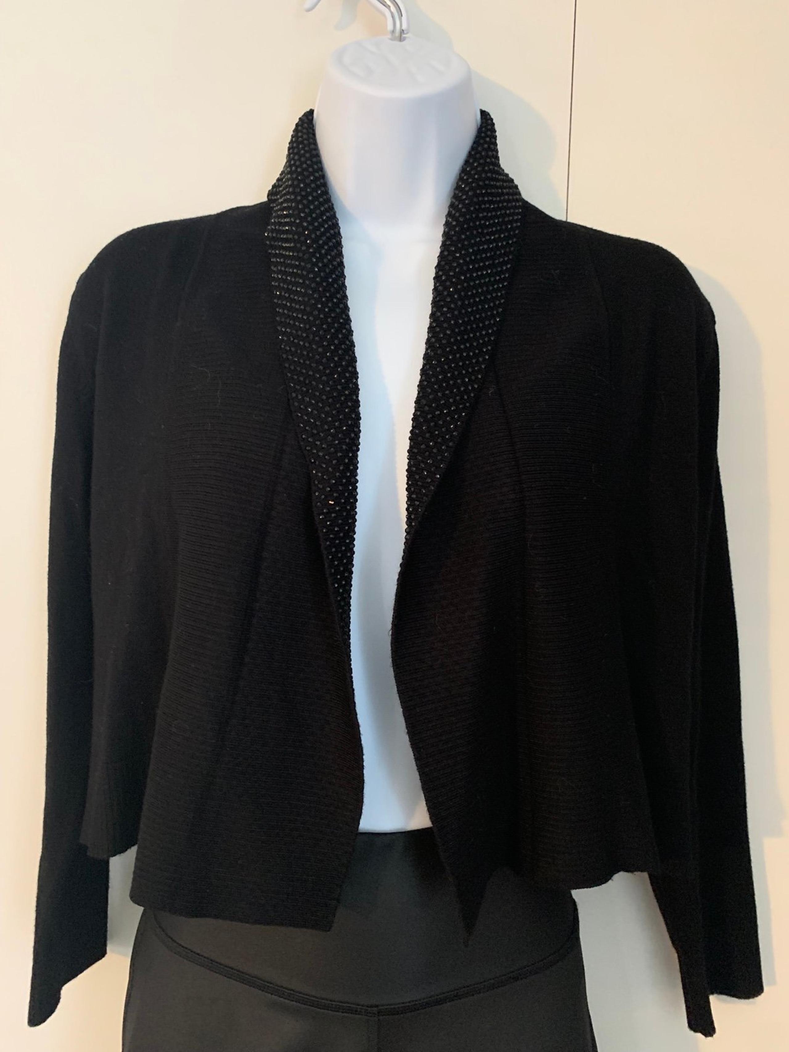 Calvin Klein women’s black shrug black crystal detail size Small