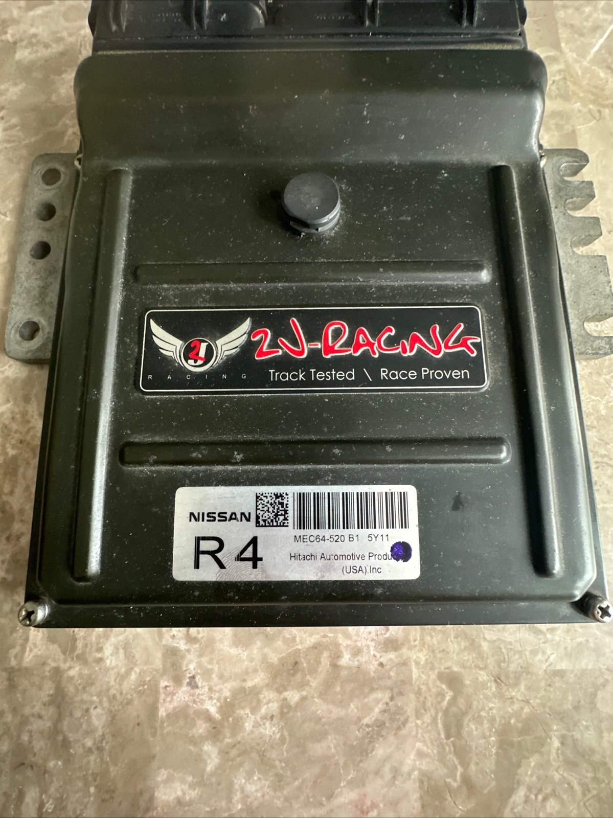 2006 Nissan Sentra engine control module ( MEC64-520B15Y11