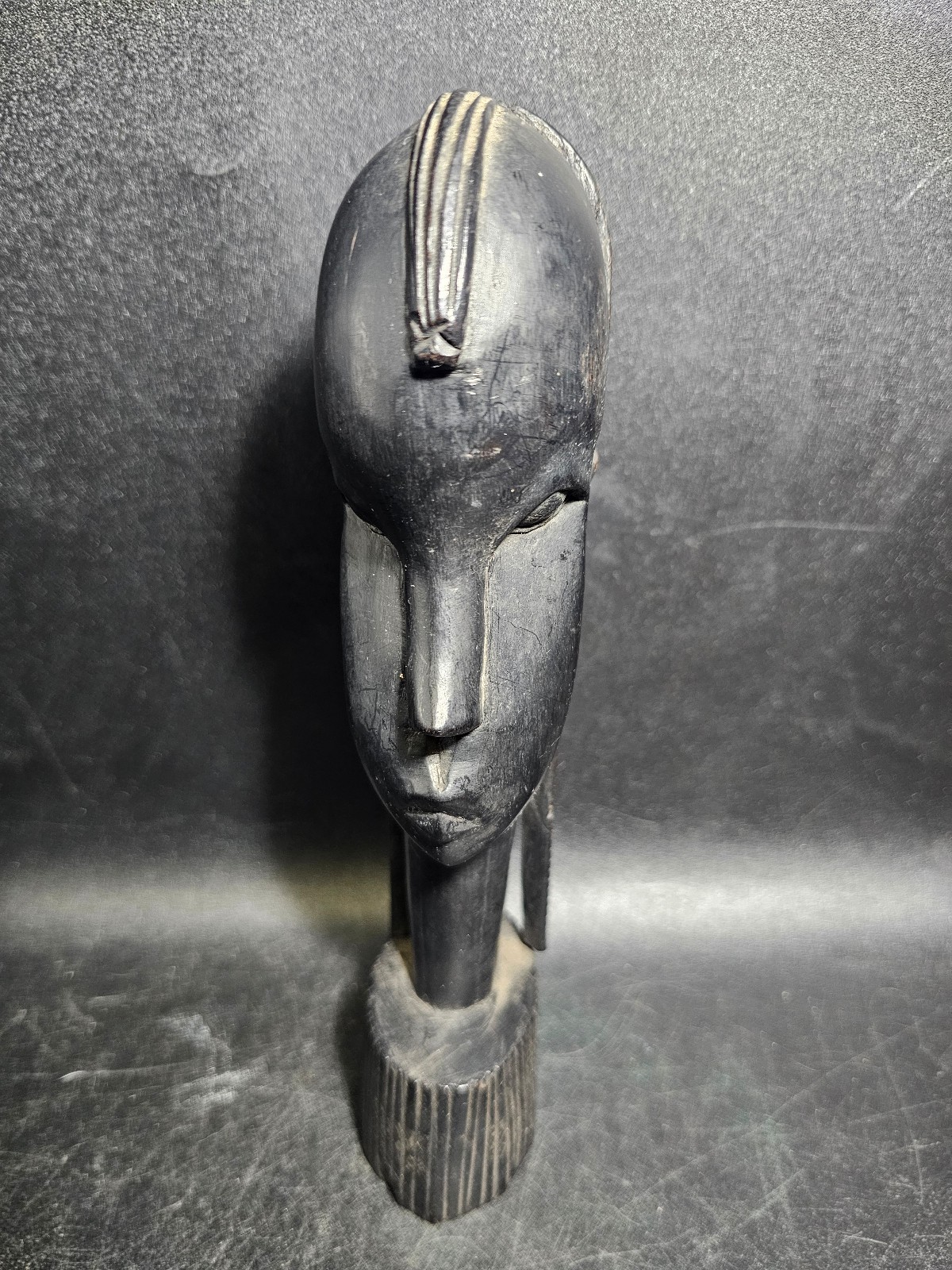 Vintage African ebony hand carving of stylized bust of a Maasai warrior.