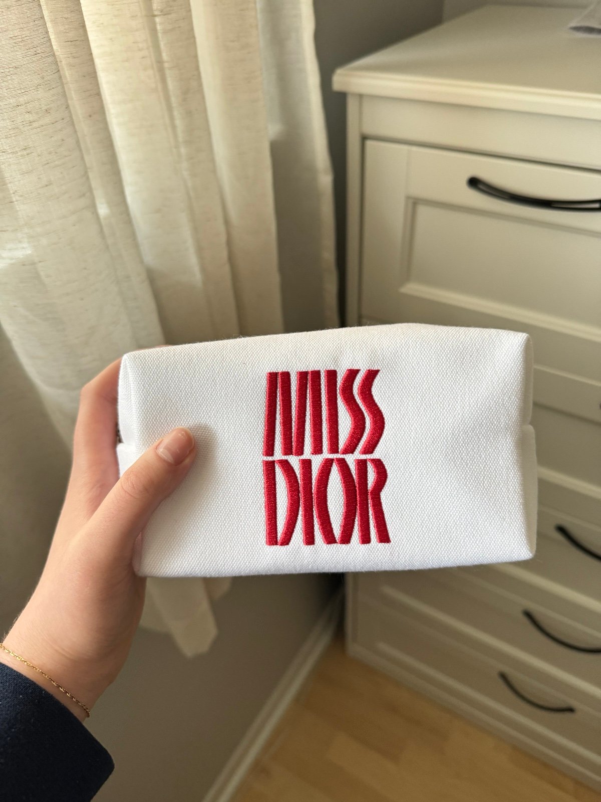 Miss Dior travel makeup pouch