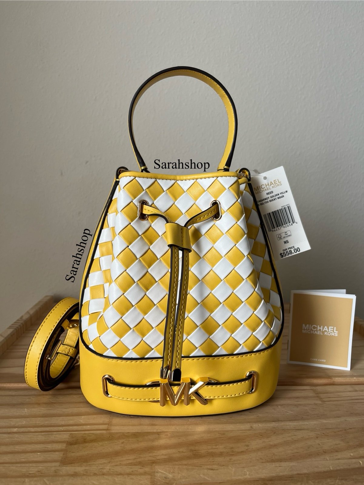 Michael Kors Reed medium belted bucket messenger