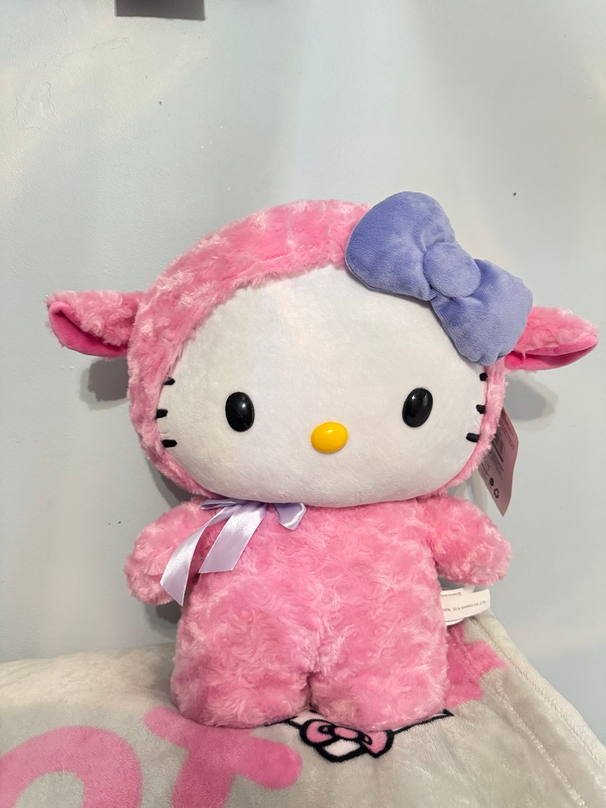 Hello Kitty pink lamb greeter
