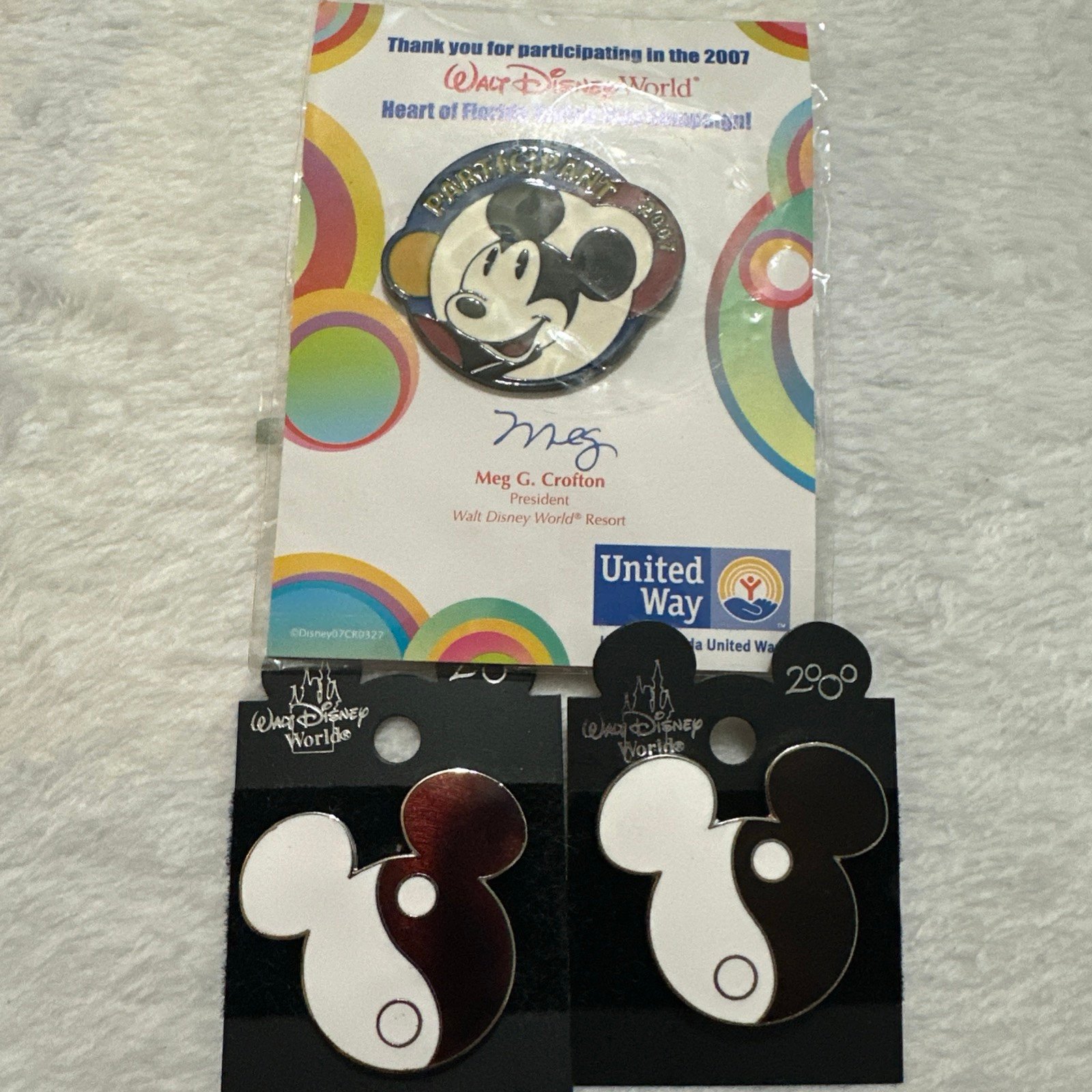 Mickey Mouse ying yang pins and heart of Florida United way campaign