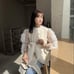 Bibiy. ANGIE SLEEVELESS JACKET