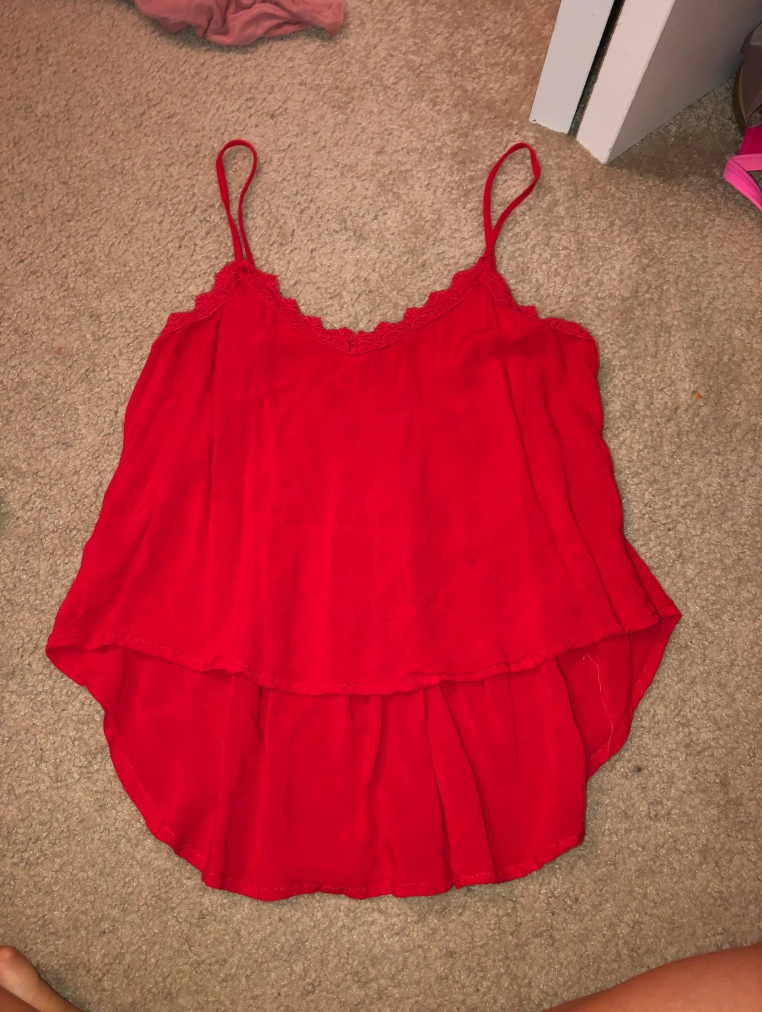 Red flowly high-low tank
