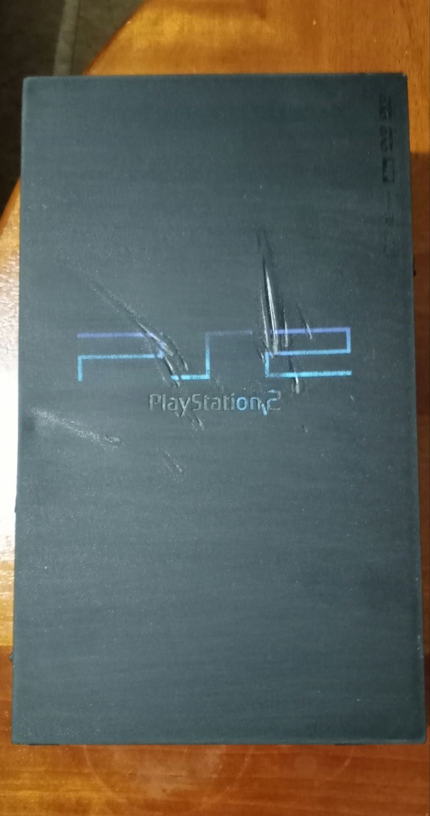 A refurbished Ps2 charcoal black