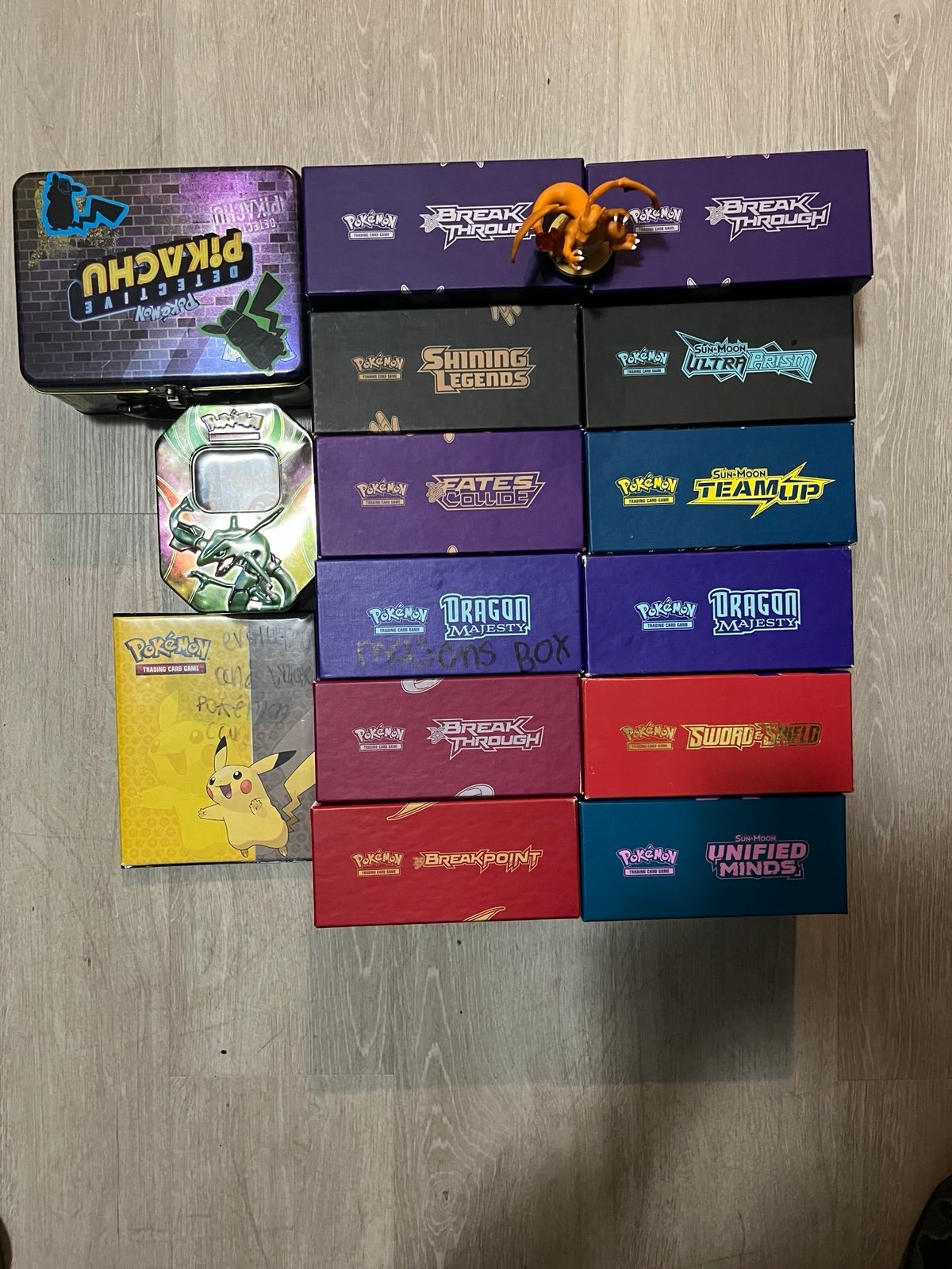 pokemon lot with charizard amibo binder and tins