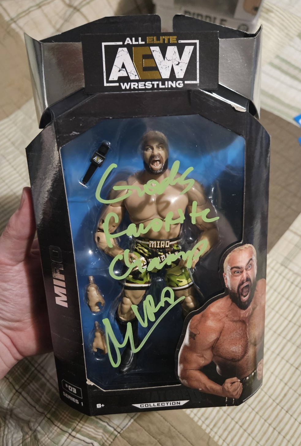 Aew miro signed action figure