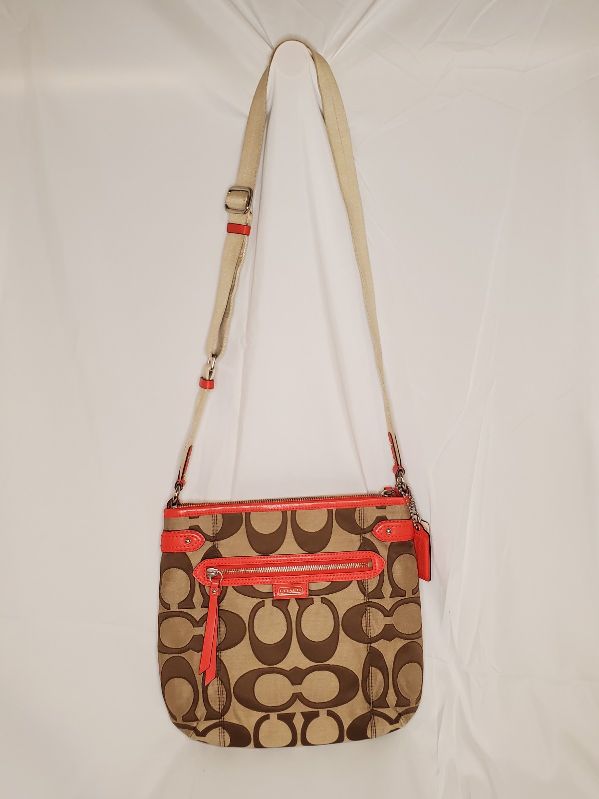 Coach signature crossbody with orange leather trim, style F24061