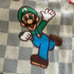 Mario & Luigi no sew blanket. It has chocolate on the back. 72 x 60, 2 yards